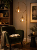 Dual Suspended Glass Globe Floor Lamp — Warm Ambient Glow Brass Finish